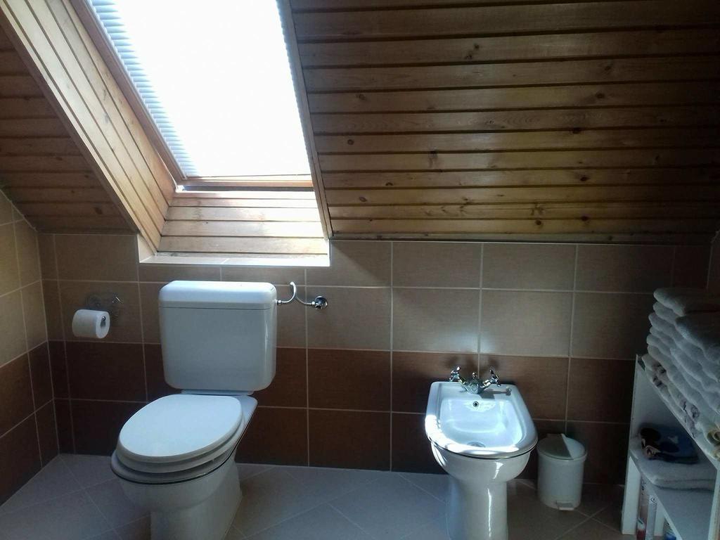 Erzsebet Vendeghaz Es Apartman ไฮจ์ดุสโซบอสโล ภายนอก รูปภาพ